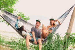 commercial product photography life style images people in hammock on the beach by vancouver photographer Rob Trendiak branding and marketing photo